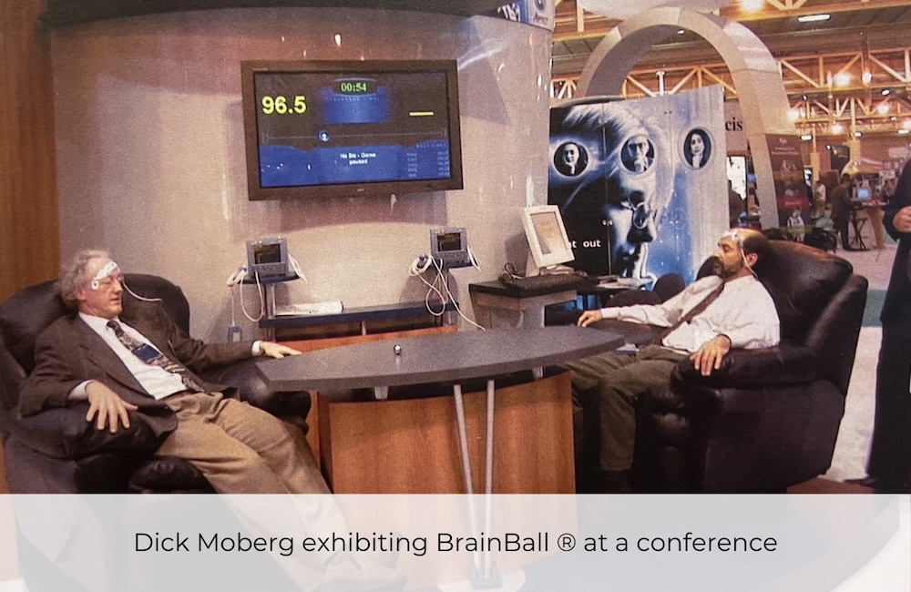 Dick Moberg exhibiting BrainBall at a conference - 2002